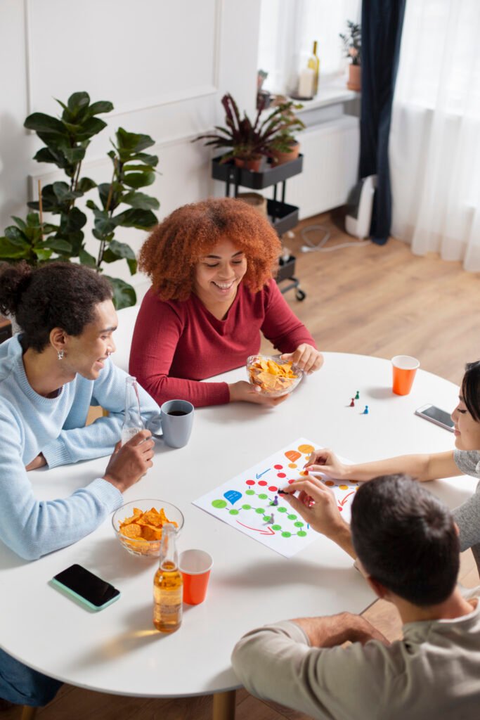 Friends playing a tabletop board game together